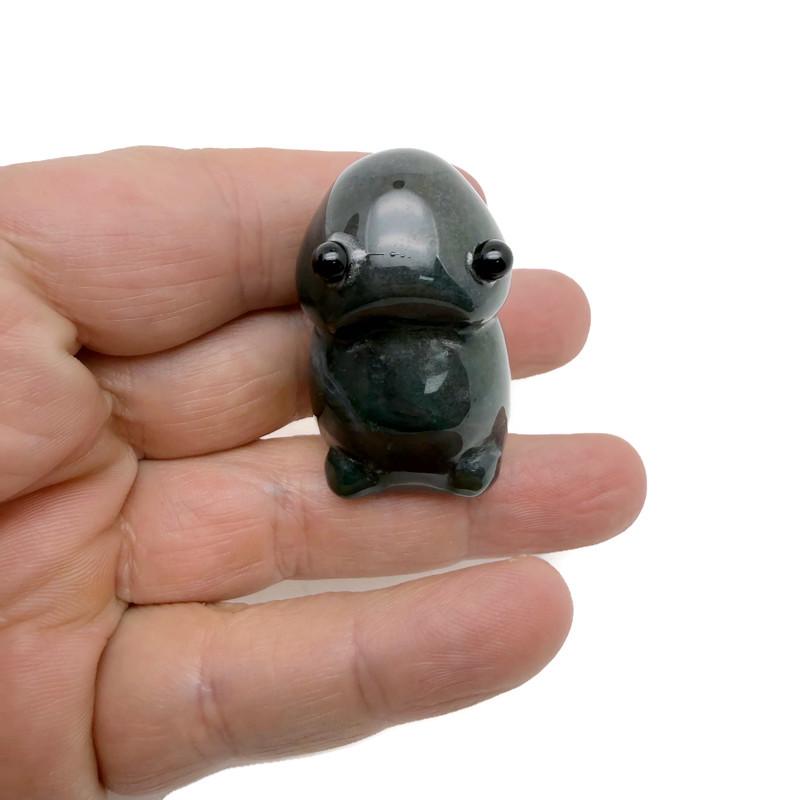 Handcrafted gemstone frog monster carving by GemstoneGO, detailed creature statue made from colorful crystals.
