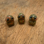Handcrafted Unakite frog monster crystal carving by GemstoneGO, detailed gemstone creature statue with vibrant green and pink hues.