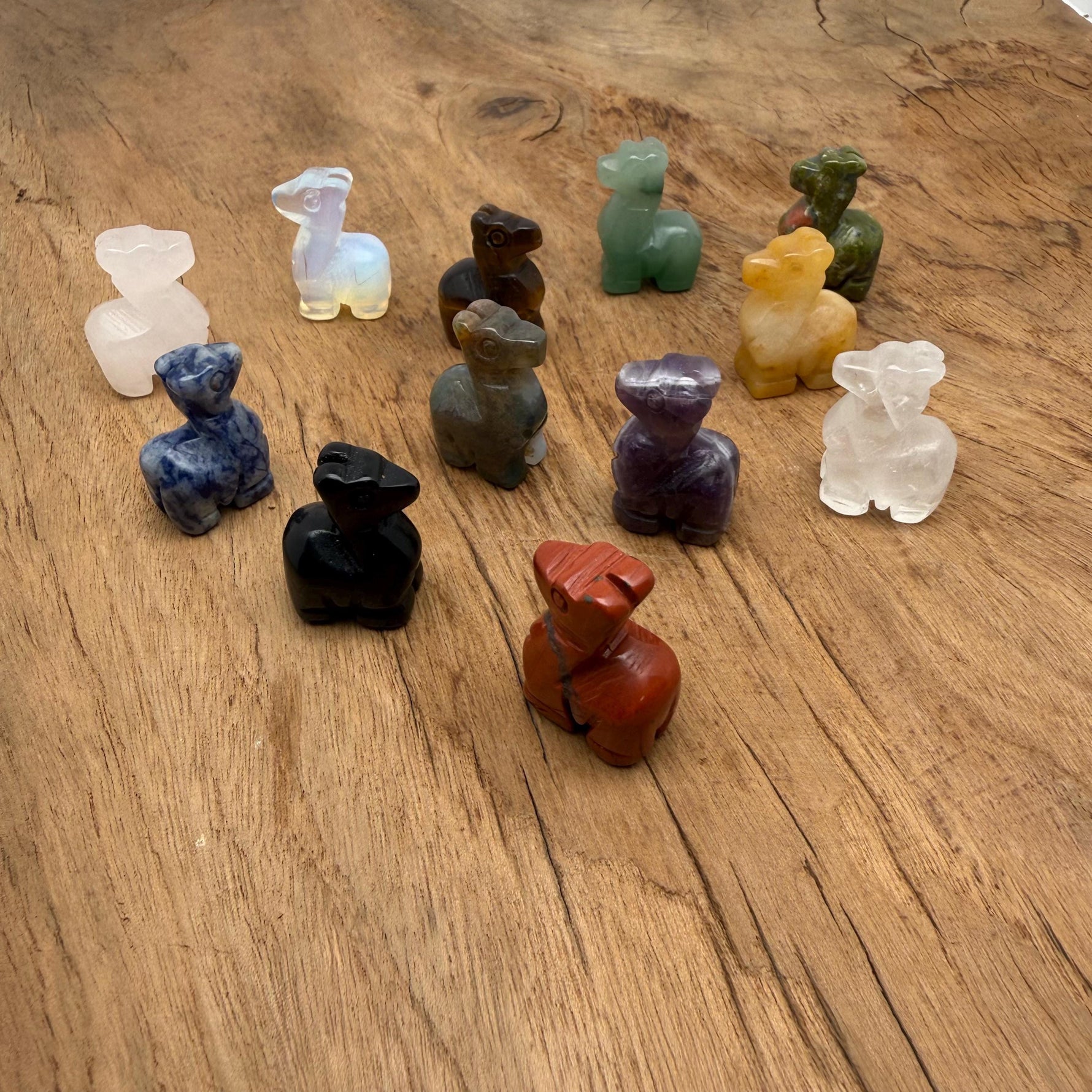 Handmade 30mm carved crystal llama animal figure by GemstoneGO, featuring a colorful mixed gemstone design.