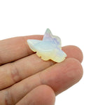 Handmade carved crystal wolf head animal figure, 30mm, in mixed gemstone colors, crafted by GemstoneGO.