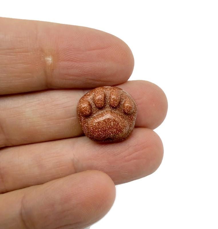 15mm Crystal Cat Paw Beads in mixed colors by GemstoneGO, featuring drilled holes for jewelry making or craft projects.