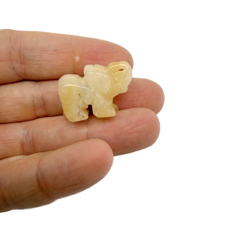 Handmade carved gemstone crystal elephant figurine, 30mm, showcasing detailed craftsmanship and vibrant mixed gemstone colors.