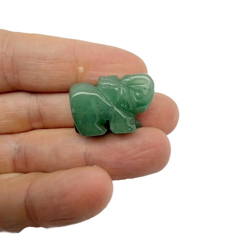 Handmade carved crystal elephant figurine, 30mm gemstone animal sculpture by GemstoneGO, showcasing detailed craftsmanship.
