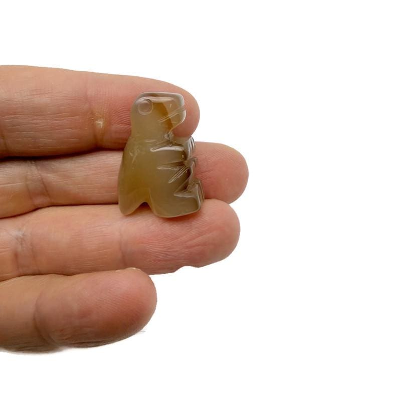 Handmade 30mm Crystal T-Rex Dinosaur figurine by GemstoneGO, carved gemstone with detailed dinosaur features.