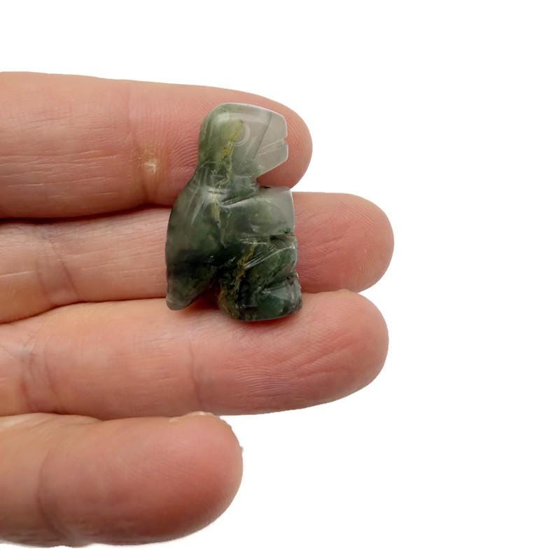Handmade 30mm crystal T-Rex dinosaur gemstone figure with carved details, featuring a mix of colorful gemstones.