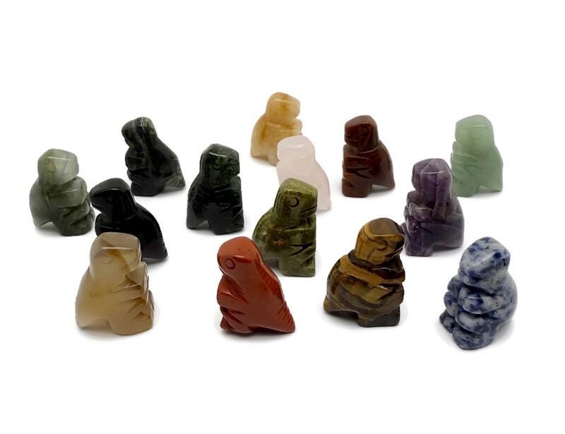 Handmade 30mm Crystal T-Rex dinosaur gemstone figure by GemstoneGO, carved details, multicolor mineral with intricate features.