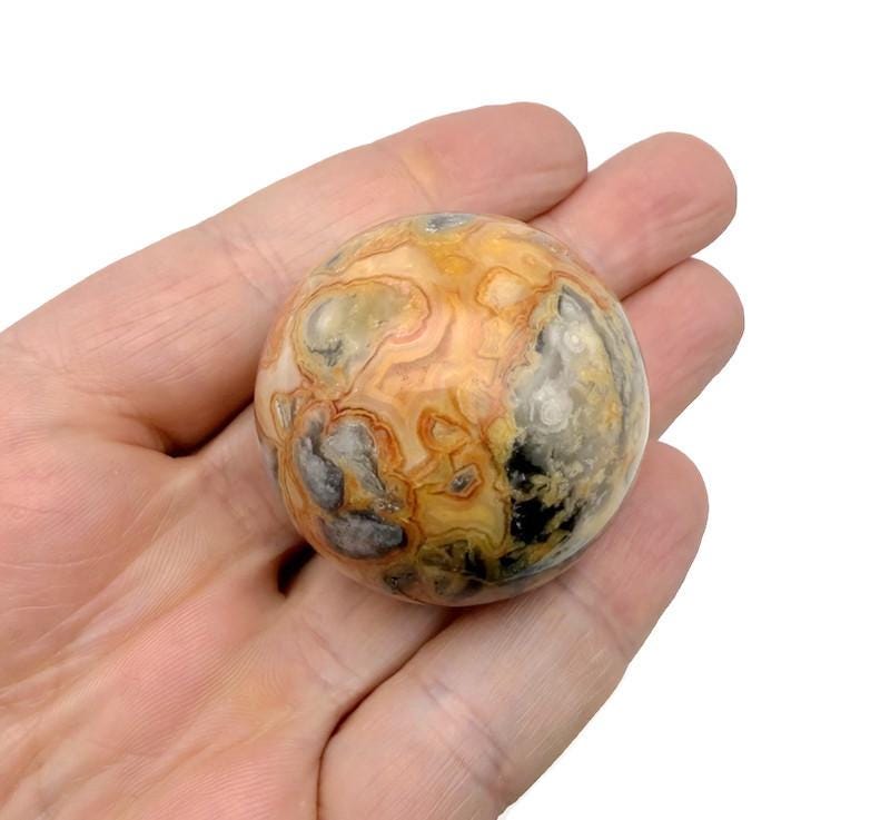 Crazy Lace Agate gemstone sphere, 40-50mm crystal ball with intricate colorful patterns, from GemstoneGO.