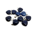 Lapis lazuli heart-shaped pendant with mini crystal accent from GemstoneGO, showcasing a deep blue gemstone with gold-tone accents.