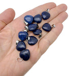 Lapis Lazuli heart-shaped pendant from GemstoneGO featuring a mini crystal design, showcasing deep blue and gold flecks.