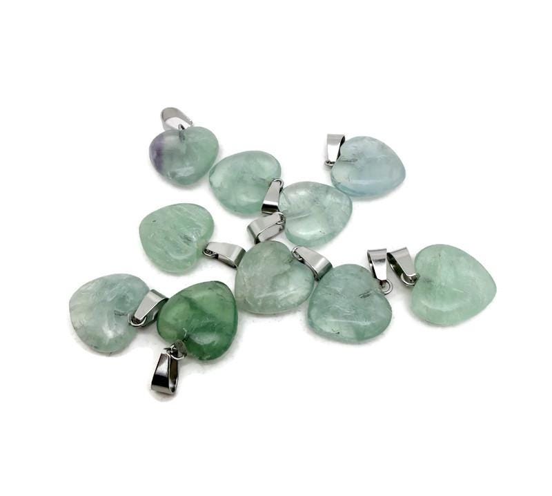 Mini fluorite heart pendant from GemstoneGO featuring a colorful crystal-shaped gemstone on a silver chain.