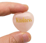 Rose quartz heart crystal engraved with symbols representing love, trust, strength, and happiness, by GemstoneGO.
