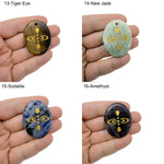 Drilled crystal amulet engraved with cosmic energy symbol, representing universe alignment, from GemstoneGO.