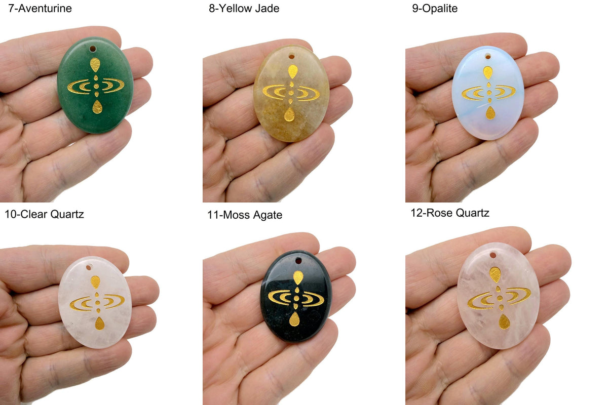 Drilled cosmic energy symbol engraved gemstone crystal pendant featuring universe alignment design by GemstoneGO.