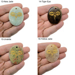 Crystal amulet with engraved Buddha eyes design, drilled for spiritual insight and guidance by GemstoneGO.
