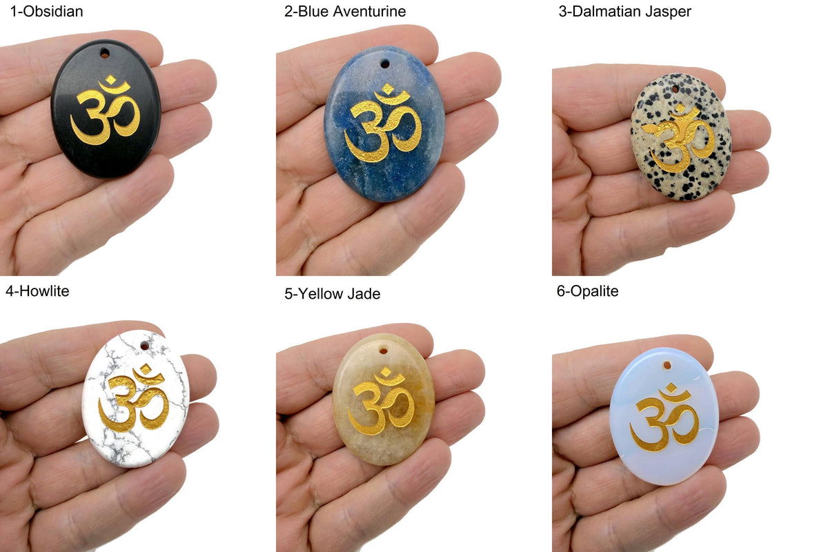 Crystal amulet with engraved Om symbol, drilled for spiritual insight and guidance, by GemstoneGO.