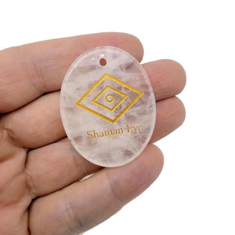 Drilled Shaman Eye engraved crystal by GemstoneGO, featuring intricate carvings for intuitive energy protection.