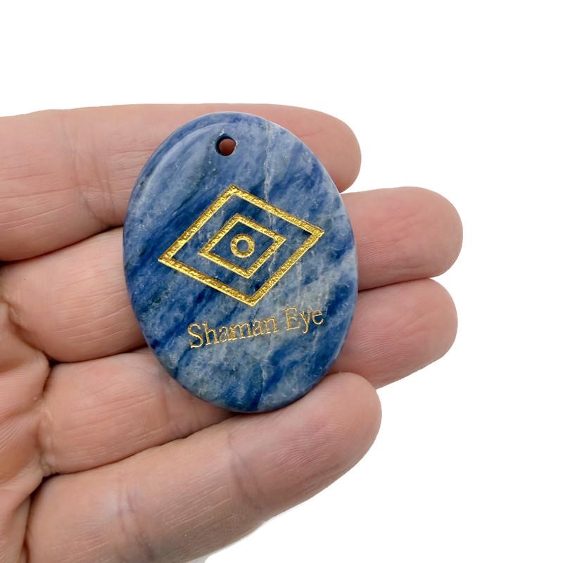 Shaman Eye engraved crystal pendant by GemstoneGO, drilled for intuitive energy protection and spiritual healing.