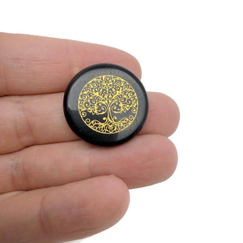 Drilled Tree of Life engraved crystal pendant by GemstoneGO, featuring a detailed spiritual connection amulet.