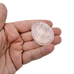 Rose quartz worry stone from GemstoneGO, 45mm soothing crystal with polished smooth surface and gentle pink hue.
