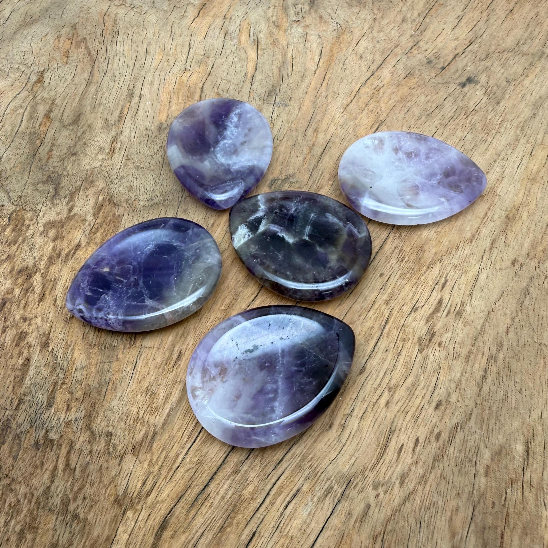 Amethyst worry stone from GemstoneGO, 45mm soothing crystal with polished surface and natural purple gemstone appearance.