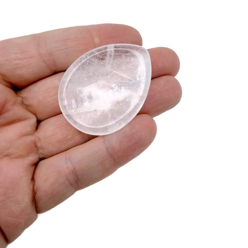 Clear quartz worry stone from GemstoneGO, 45mm soothing crystal for stress relief and meditation, smooth polished surface.