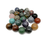 25mm natural crystal sphere by GemstoneGO, showcasing a clear, polished gemstone ball on a neutral background.
