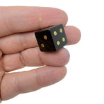 Polished gemstone crystal dice for metaphysical use and gaming, featuring carved designs in a colorful mix from GemstoneGO.