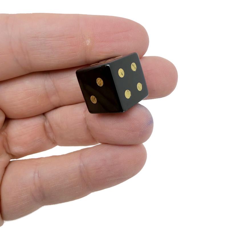 Polished gemstone crystal dice for metaphysical use and gaming, featuring carved designs in a colorful mix from GemstoneGO.