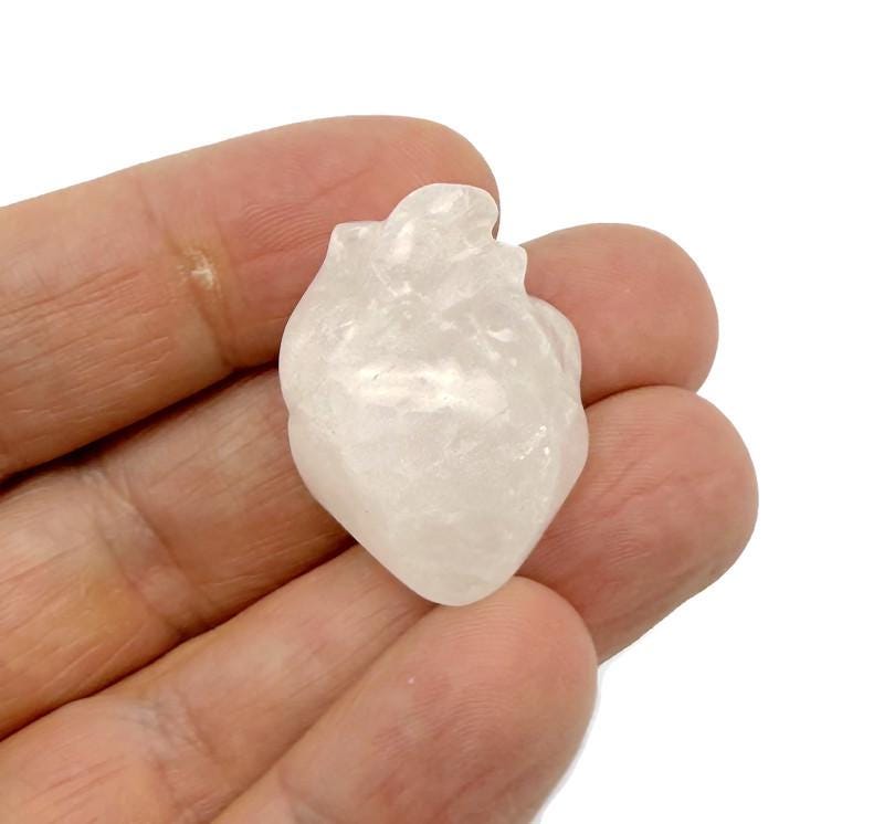 Handmade 30mm crystal heart figure carved from gemstone, featuring a colorful mix of natural stone patterns.