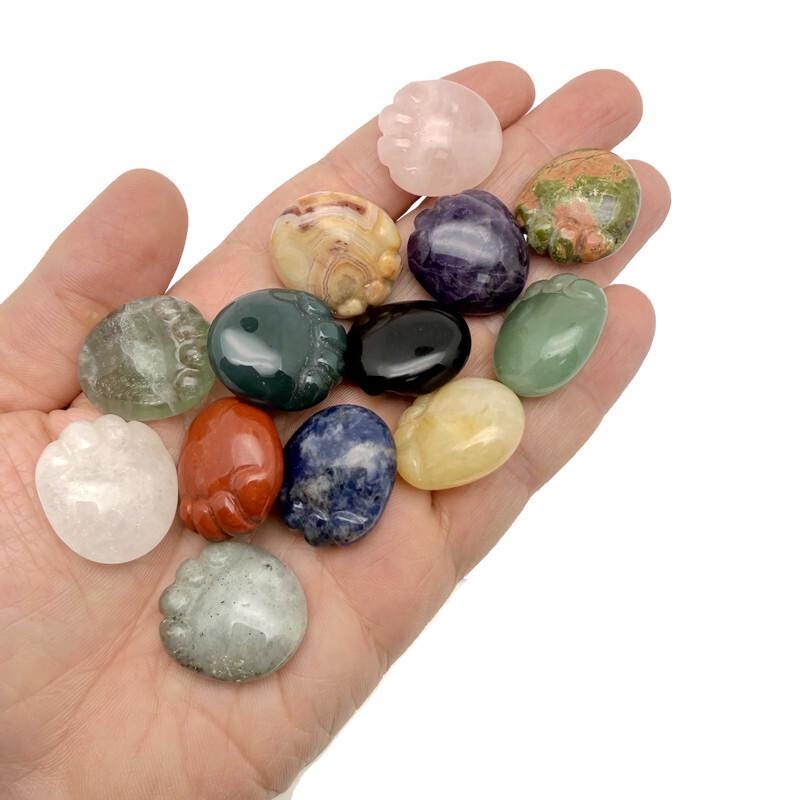 Handmade carved crystal cat paw animal figure, 25mm, in mixed gemstones, showcasing intricate craftsmanship and vibrant mineral colors.