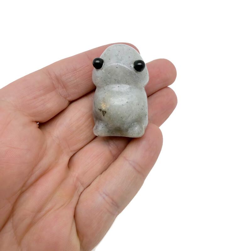 Labradorite frog monster gemstone carving, handcrafted creature statue with iridescent labradorite crystal details.