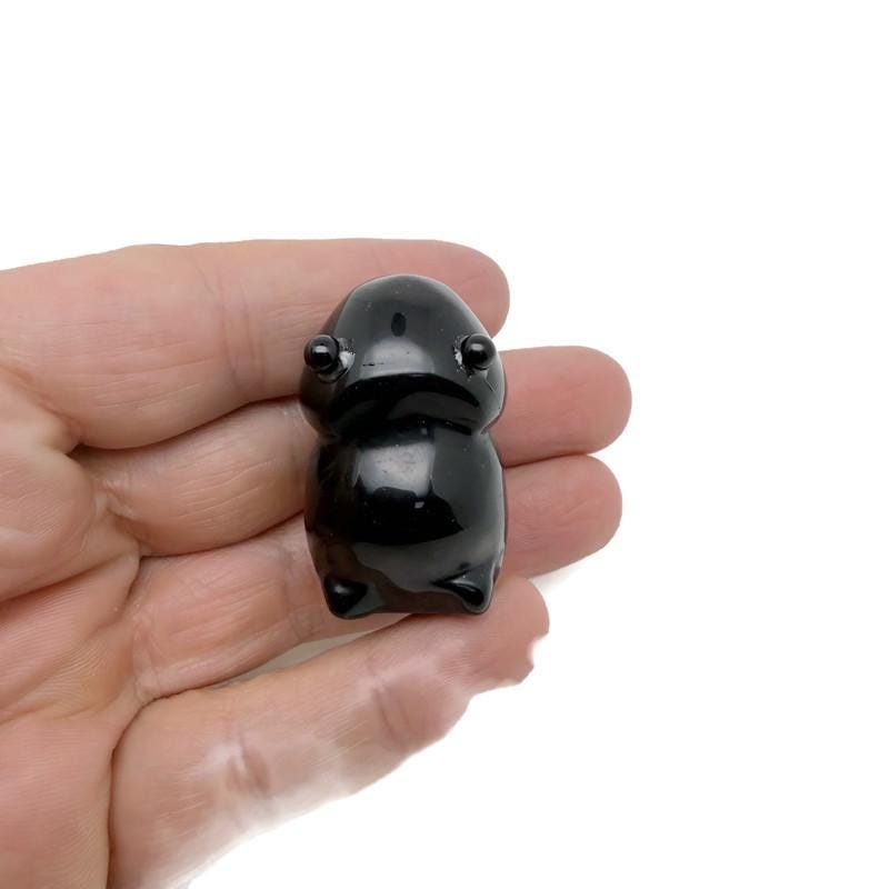 Handcrafted obsidian frog monster crystal carving by GemstoneGO, featuring a detailed gemstone creature statue with intricate textures.