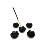 Obsidian crystal flower-shaped incense holder from GemstoneGO, designed for cleansing and relaxation with a polished, decorative appearance.