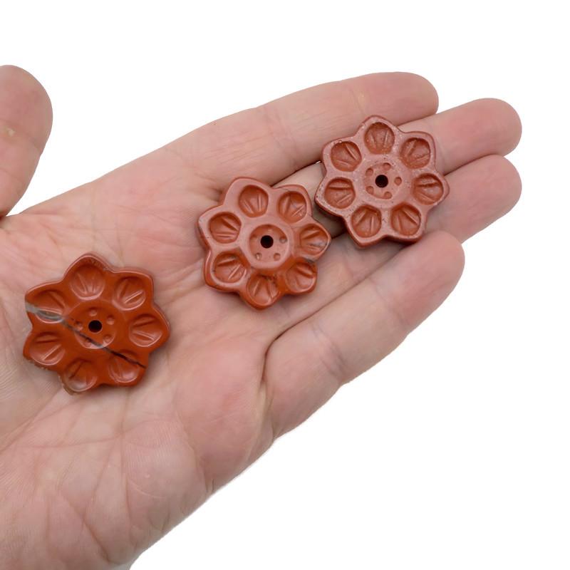 Red Jasper natural crystal flower incense holder with carved gemstone design, ideal for meditation and stick burning.