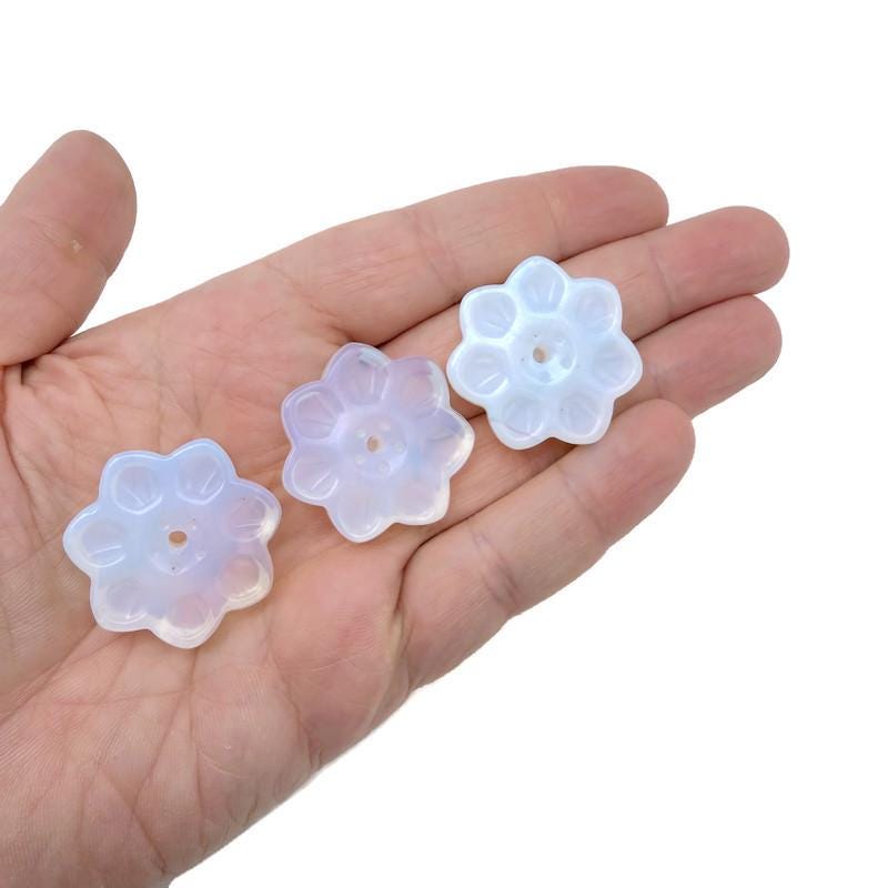Opalite crystal flower incense holder from GemstoneGO, carved gemstone stick burner for meditation and spiritual rituals.