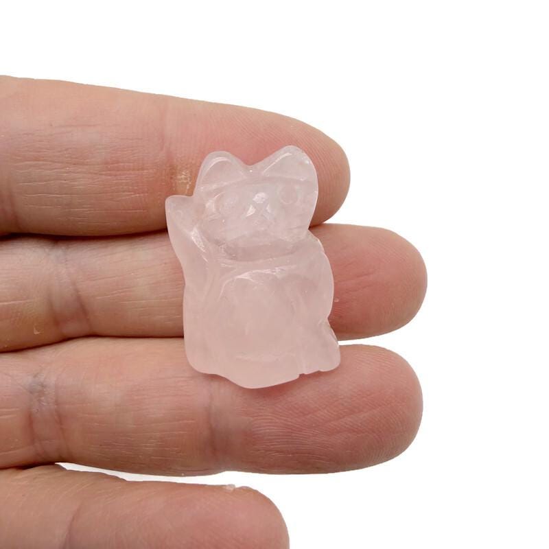 Handmade 30mm crystal cat animal figure by GemstoneGO, carved gemstone sculpture in mixed colors on a plain background.