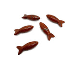 Red Jasper fish gemstone pendant featuring a fish design, perfect as a lucky fishing charm gift by GemstoneGO.