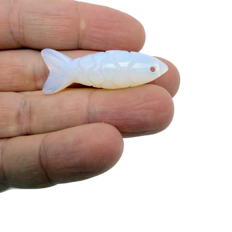 Opalite fish gemstone pendant featuring a lucky fishing charm design, crafted by GemstoneGO for jewelry and gift use.