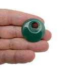 Polished crystal donut pendant from GemstoneGO, 30mm Pi Stone healing crystal component in mixed colors, smooth and polished surface.