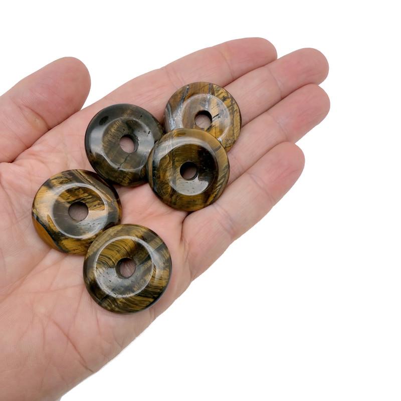 Polished 30mm Tiger Eye crystal donut pendant with natural golden-brown banding from GemstoneGO.