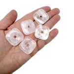 Clear quartz square crystal donut from GemstoneGO, 30mm Pi Stone with polished surface and gemstone detail.