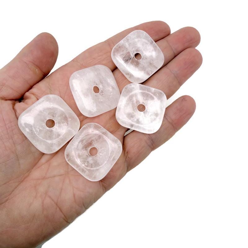 Clear quartz square crystal donut from GemstoneGO, 30mm Pi Stone with polished surface and gemstone detail.