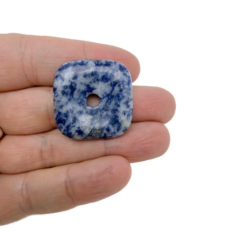 Sodalite square crystal donut pendant, 30mm Pi stone from GemstoneGO, featuring vibrant blue and white mineral patterns.