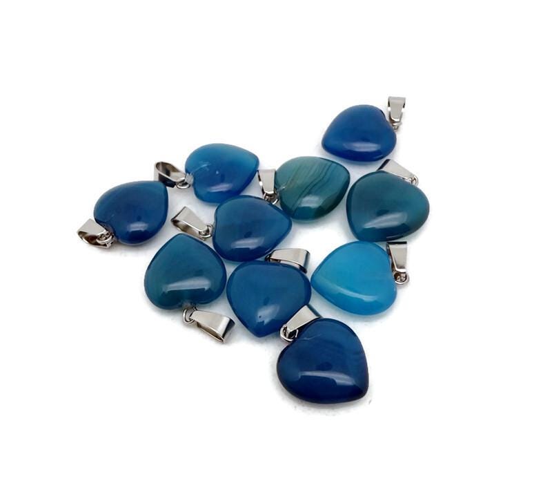 Blue agate heart pendant from GemstoneGO, featuring a mini crystal design with a polished blue gemstone heart.
