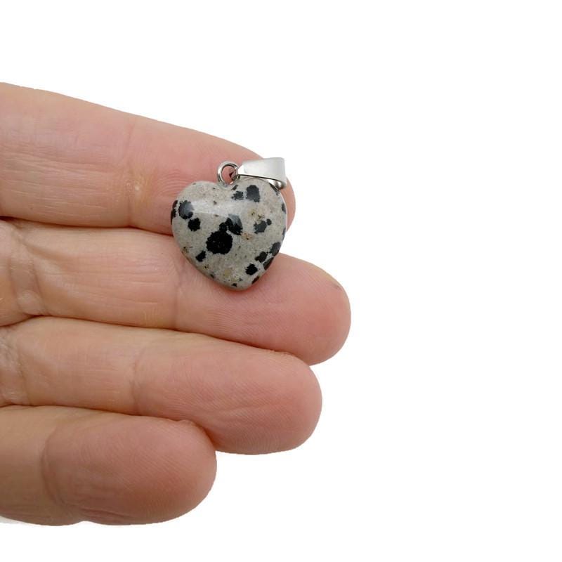 Dalmatian Jasper heart pendant with mini crystal accents from GemstoneGO, showcasing a polished, natural stone jewelry piece.