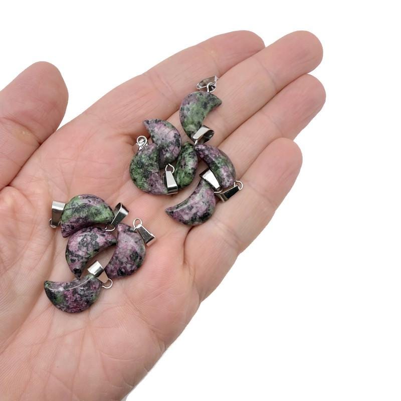 Ruby Zoisite moon pendant with crystal details, handcrafted jewelry making supply by GemstoneGO, ideal for healing and jewelry design.