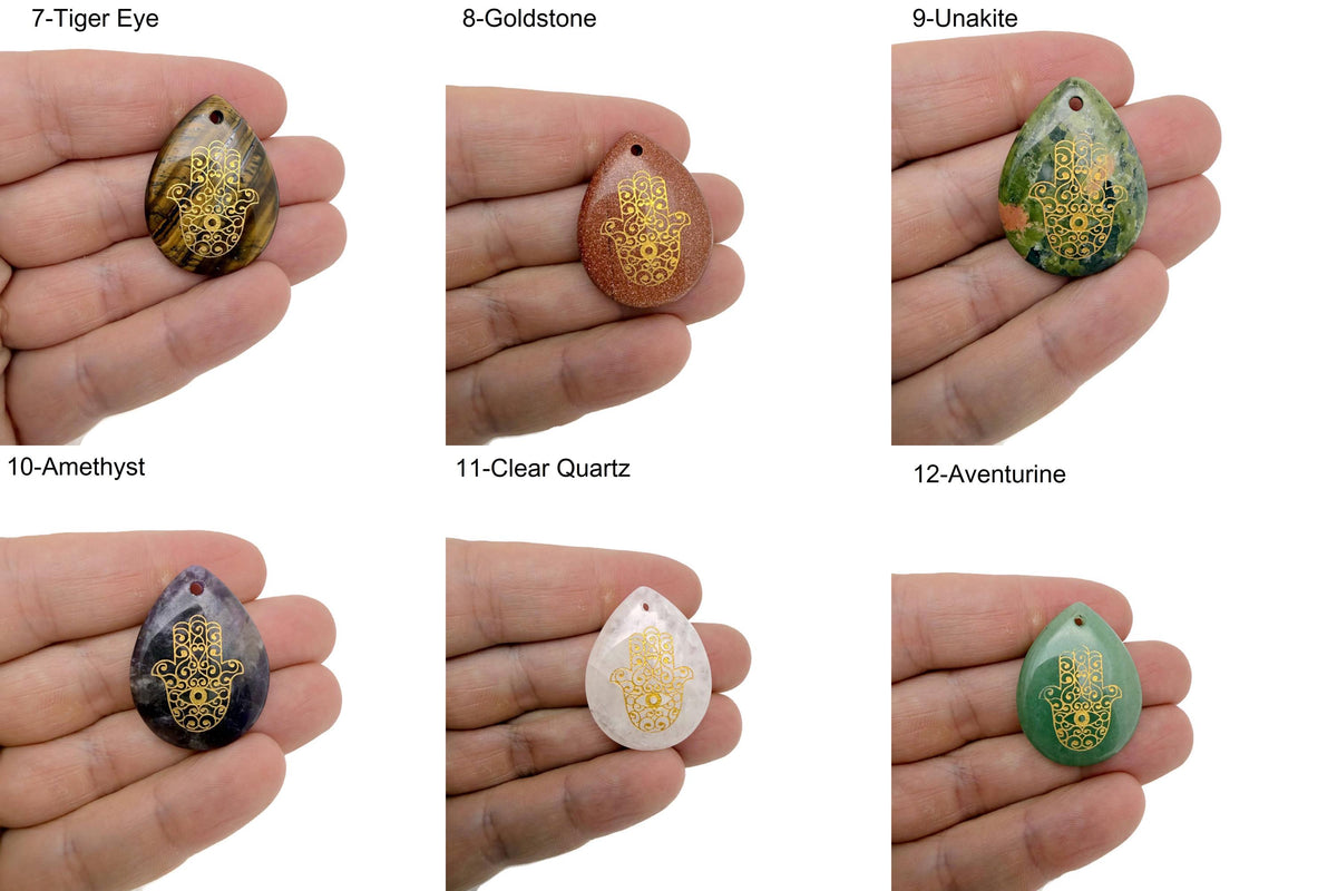 Engraved Hamsa Hand crystal from GemstoneGO with drilled holes, symbolizing protection, luck, and spiritual energy.