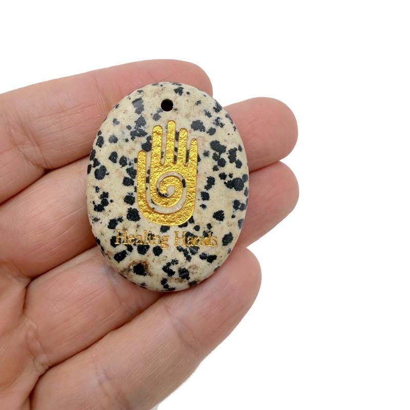 Healing Hands engraved crystal amulet by GemstoneGO, drilled energy healer gift with intricate engraved design on clear crystal.