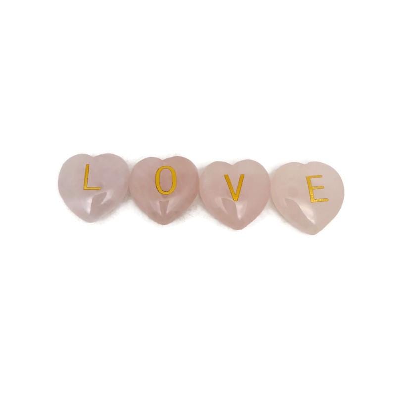 Rose quartz engraved crystal letter heart with personalized initial from GemstoneGO, featuring a polished pink gemstone with engraved letter.