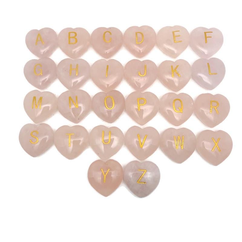 Personalized rose quartz engraved crystal letter heart with initial, showcasing a beautiful gemstone and custom engraving by GemstoneGO.